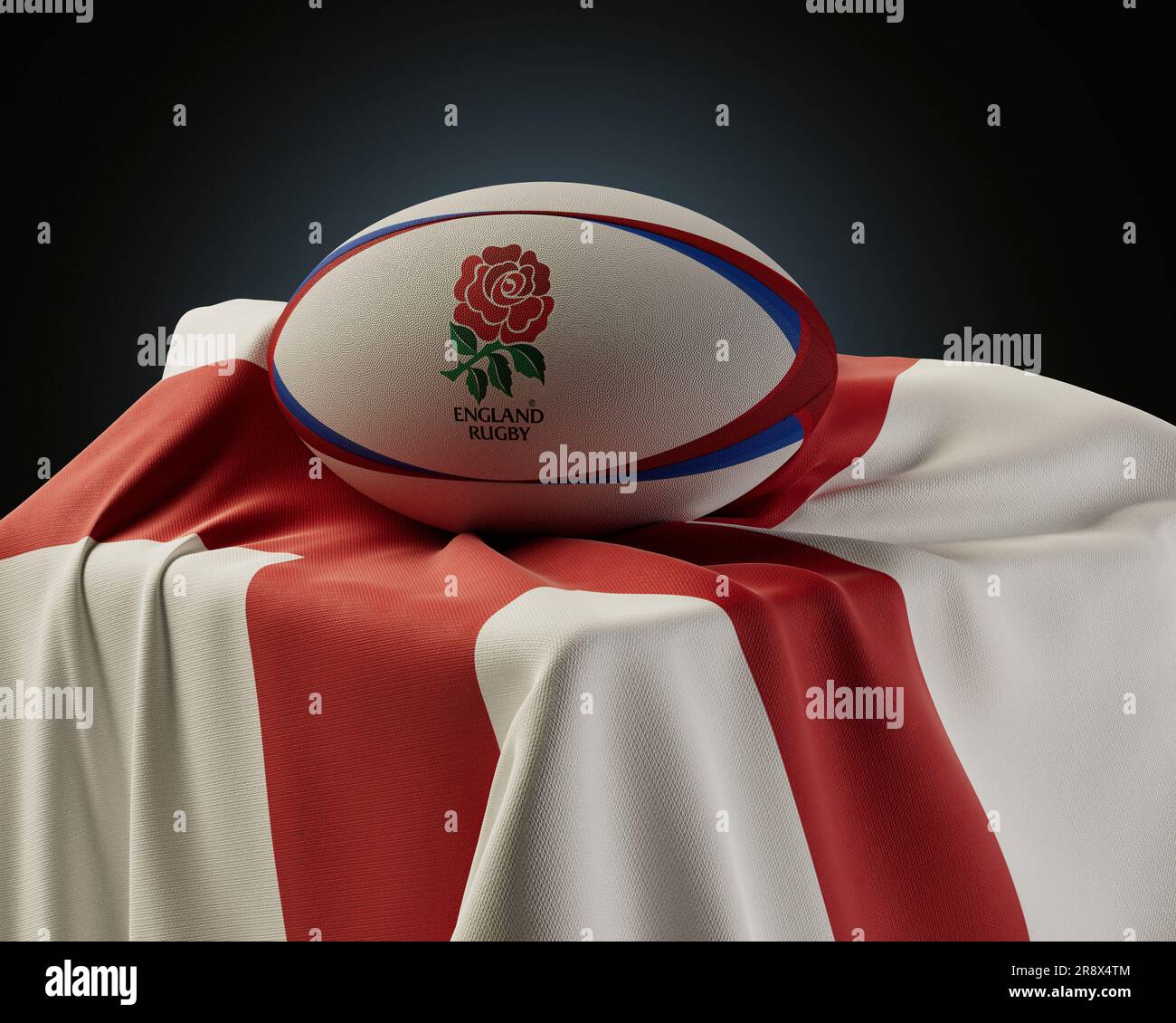 Eine 3D-Darstellung eines generischen Rugby-Balls mit dem Logo von Three Lions Rugby, das auf einer drapierten englischen Nationalflagge aufliegt - 4. Dezember 2022 in Bristol, Stockfoto