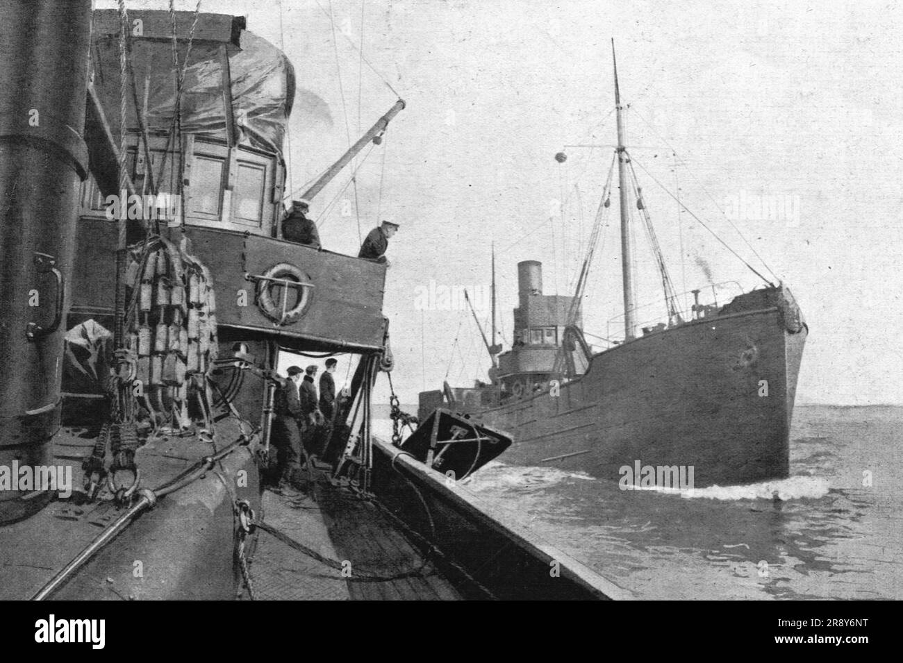 "La flotte d'avant-garde; le Dragage des Mines. Auf dem Abstieg "Drachen" (Streuung; "cerf-volent",a cause de sa forme), eine Maintenir a la prefondeur voulue le filin d'avier qui va etre tendu entre les deux Trawlers', 1916. Aus der „Collection de la Guerre IV L'Illustration Tome CXLVIII. La Guerre Juillet, Aout, Septembre, Octobre, Novembre, Dez. 1916". Stockfoto