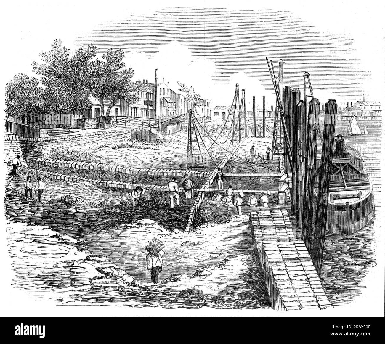 Progress of the Embankment of the Themse at Chelsea, [London], 1857. Ansicht von „...einem Teil, der von Mr. Jay, dem Bauunternehmer, unter den Wäldern und Bauwerken bearbeitet wird, fast von [Vauxhall-Brücke] bis zum Eingang zum Grosvenor Kanal, Chelsea... die Eingänge zu den verschiedenen Docks, Kanälen, &amp;c., sind von geraden gusseisernen Trägern umgeben, Und die Straße wurde repariert, um jegliche Hindernisse für die Öffentlichkeit zu vermeiden, und wird somit eine ununterbrochene Promenade über die gesamte Strecke ermöglichen; das Fundament, wie in der Zeichnung gezeigt, wird durch das so genannte Halbzeitenwerk geschaffen; und der Kahn s.si Stockfoto