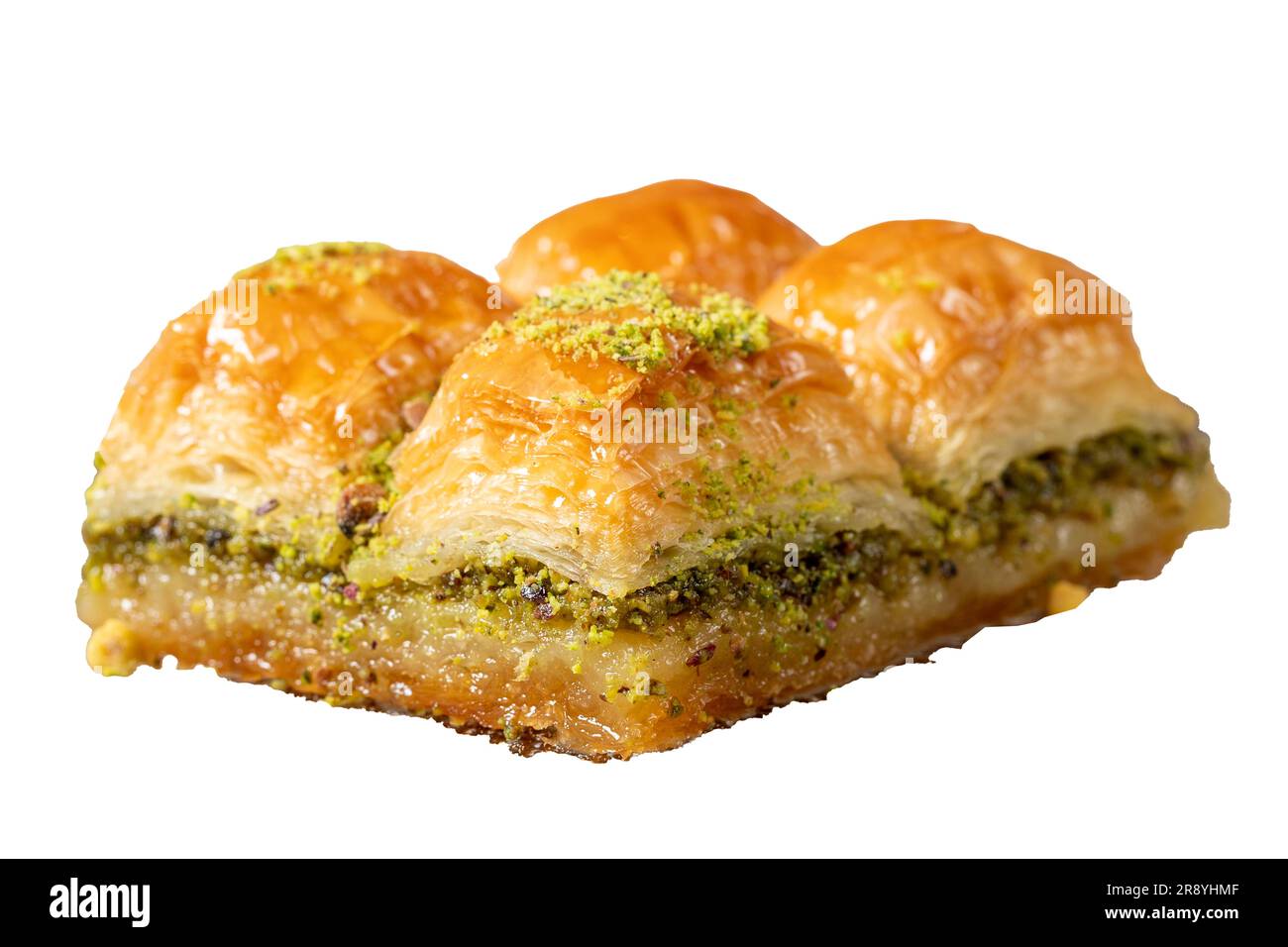 Türkische Pistazien-Baklava. Türkische Köstlichkeiten. Baklava isoliert auf weißem Hintergrund. Schließen Stockfoto
