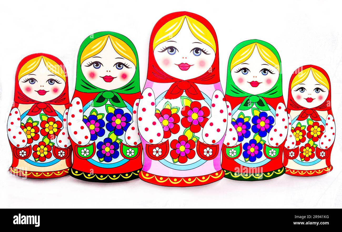 Fantastische Komposition traditioneller russischer Matryoshka-Puppen, mit lächelndem Gesicht, rosa Wangen, Blumen und hinterlassenen Konturen auf weißem Hintergrund Stockfoto