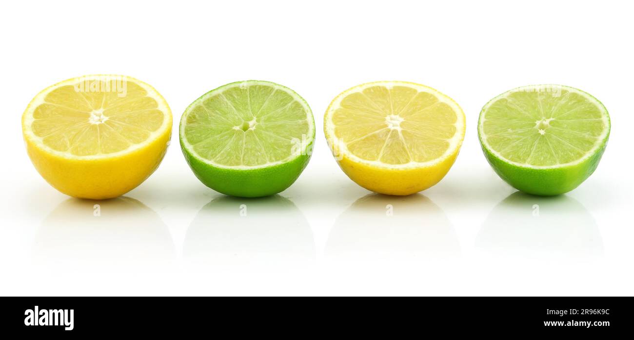 Reif in Scheiben Limette und Zitrone, Isolated on White Background Stockfoto