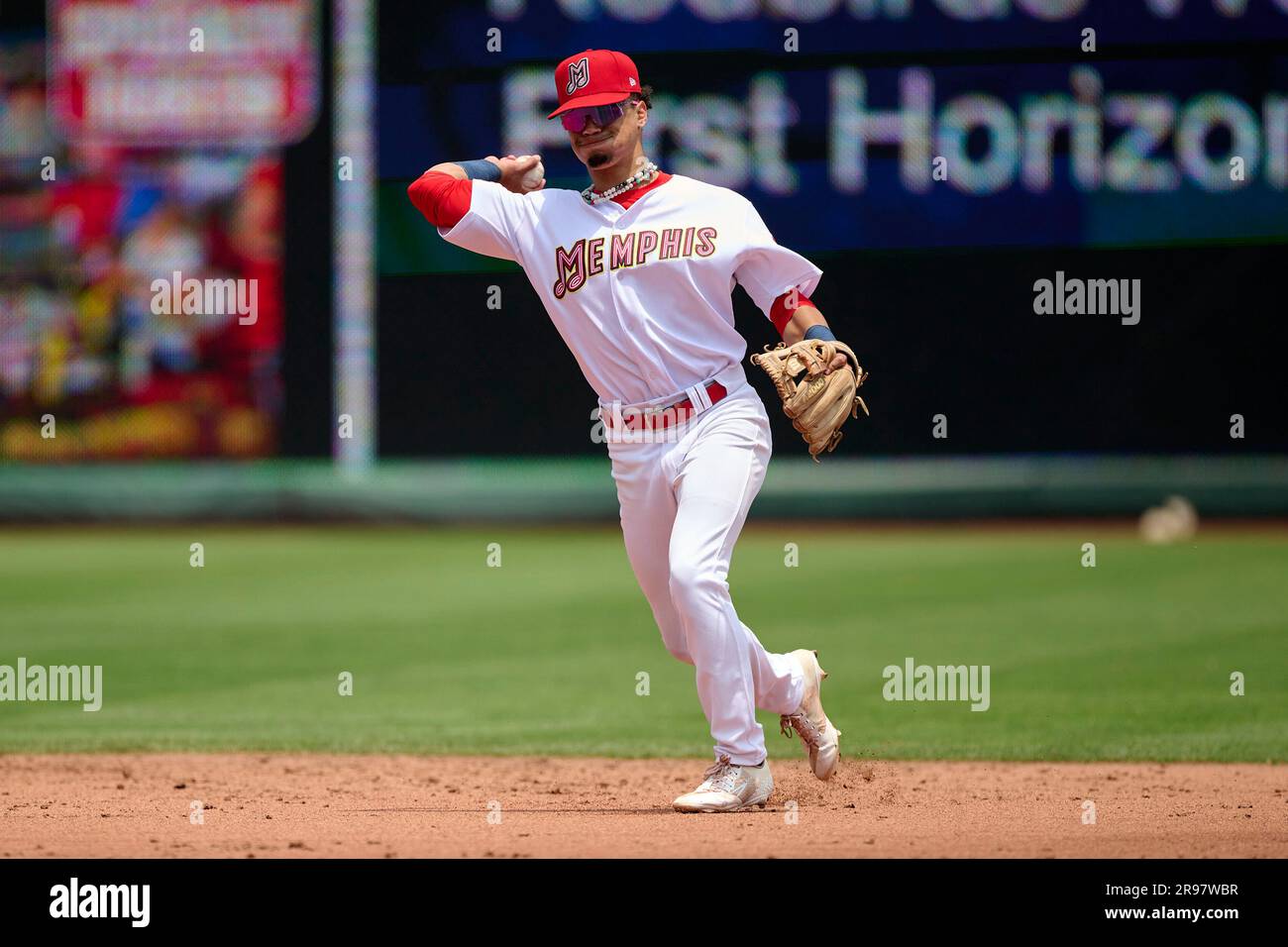 Memphis Redbirds shortstop Masyn Winn (5) throws to first base during an MiLB International League baseball game against the Norfolk Tides on May 24, 2023 at AutoZone Park in Memphis, Tennessee. (Mike Janes/Four Seam Images via AP) Stockfoto