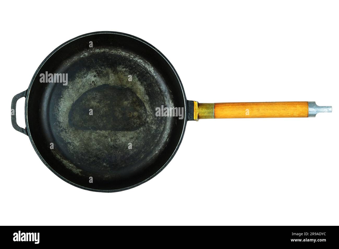 Gusseisenwanne. Pan wurde verwendet. Kochgeschirr isoliert auf weißem Hintergrund. Draufsicht. Stockfoto