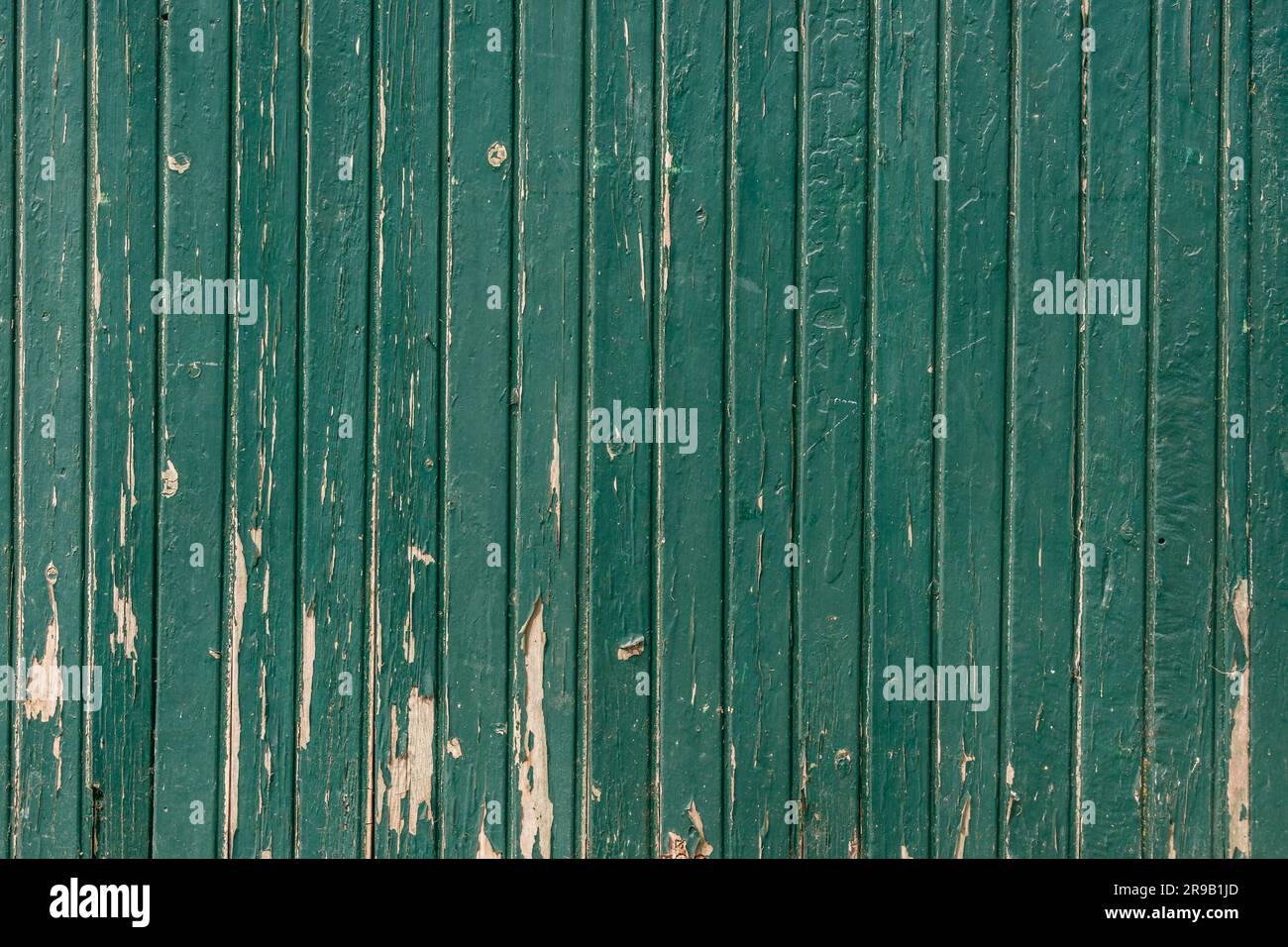 Hölzerne Hintergrund mit verwitterten Lack in der Farbe Petrol Stockfoto