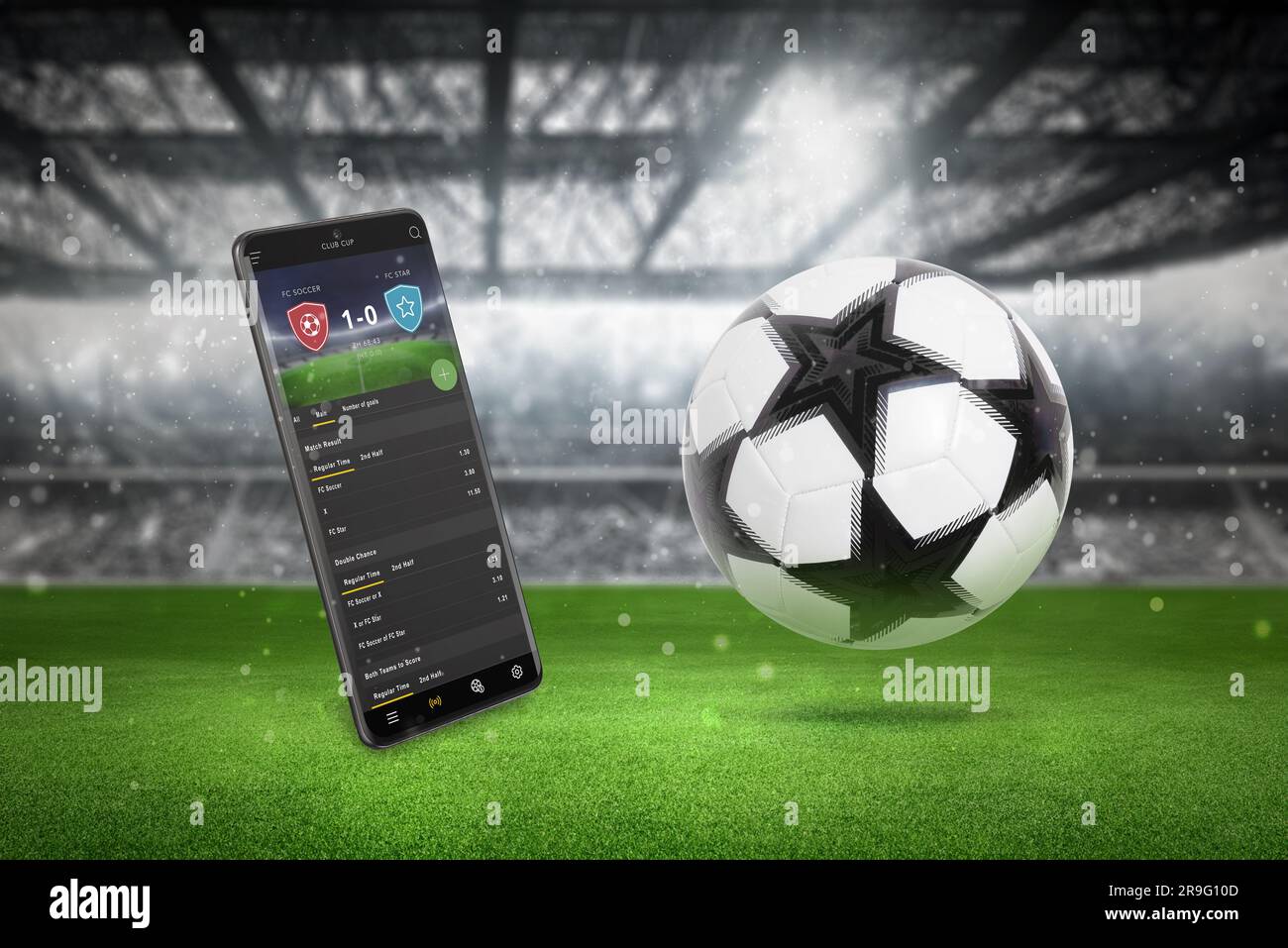 App für Live-Ergebnisse auf dem Smartphone auf dem Fußballfeld. Gras mit federndem Ball und steht im Hintergrund Stockfoto