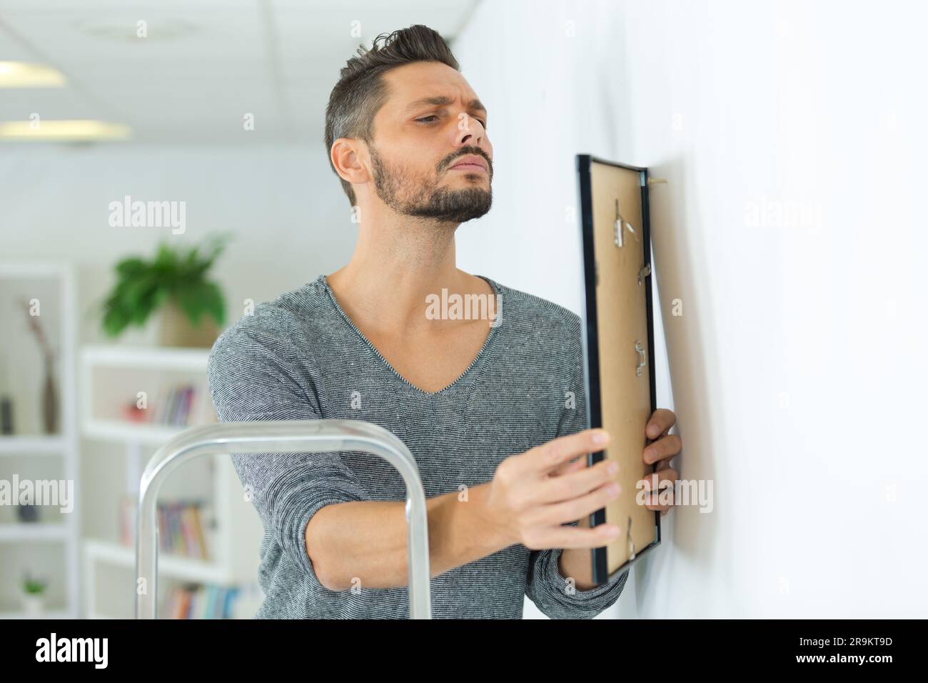 Mechaniker, Bilderrahmen auf Wand Stockfoto