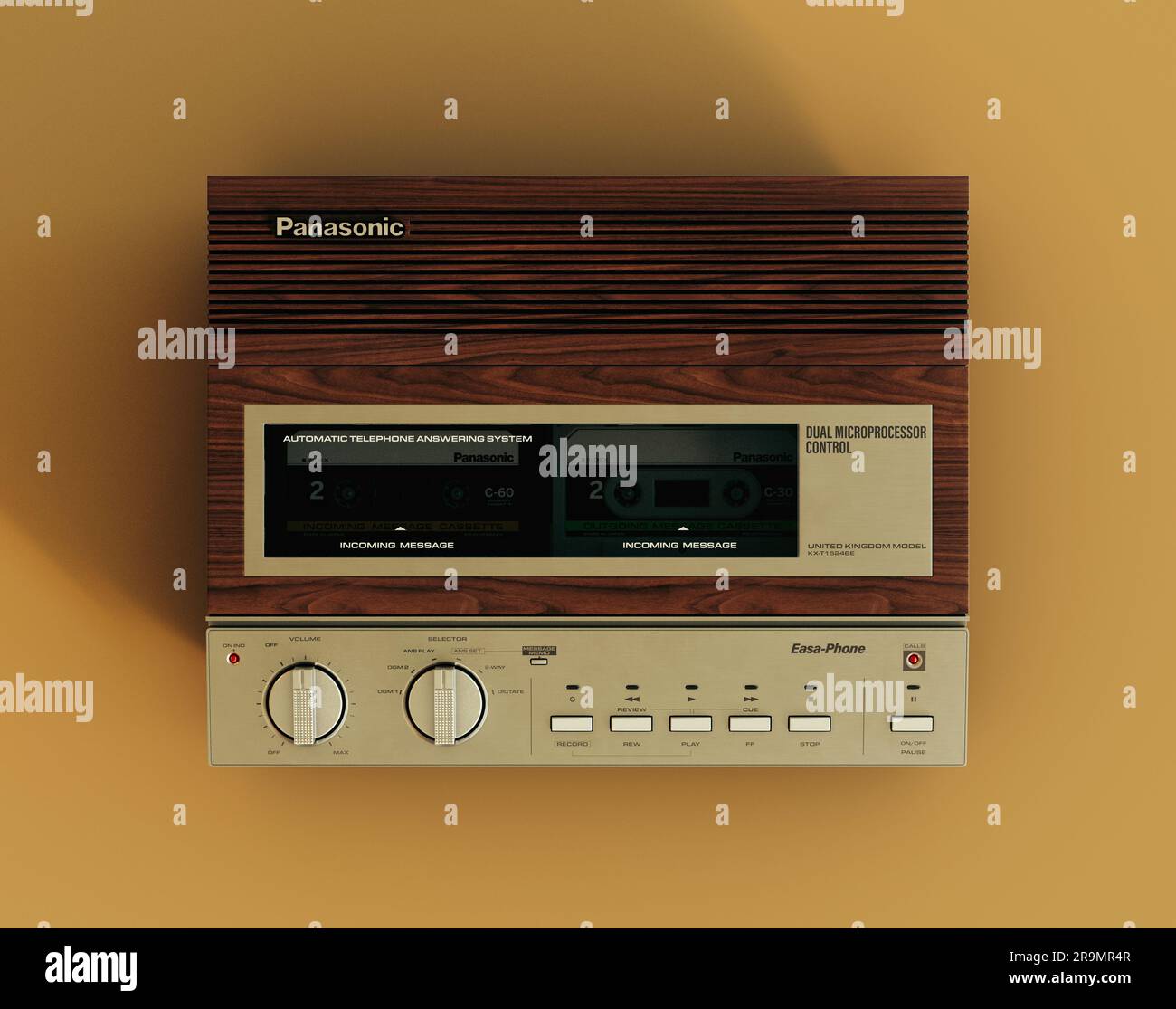Rendering eines Panasonic-Anrufbeantworters aus den 80er Jahren im Jahr 3D auf senffarbenem gelbem Hintergrund - 07. Juni 2023 in Bristol, Großbritannien Stockfoto