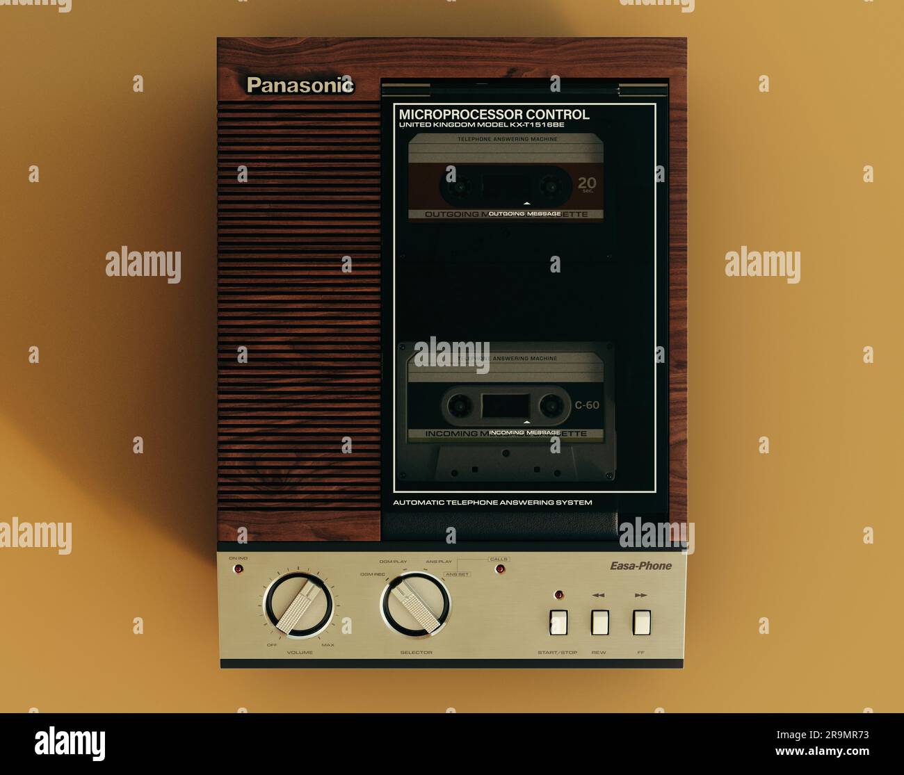 Rendering eines Panasonic-Anrufbeantworters aus den 80er Jahren im Jahr 3D auf senffarbenem gelbem Hintergrund - 07. Juni 2023 in Bristol, Großbritannien Stockfoto