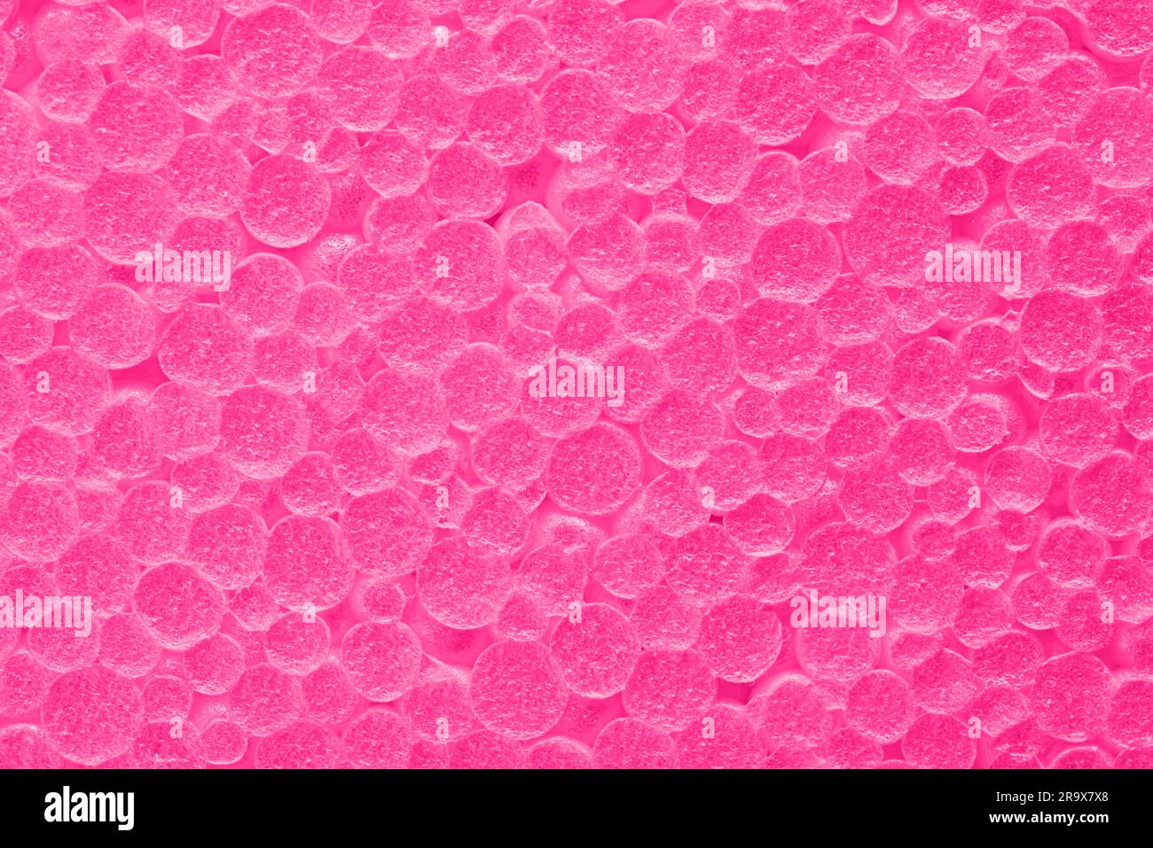 Textur aus rosafarbenem Schaumstoff. Pinkfarbene Luftblasen mit strukturiertem Hintergrund. Stockfoto