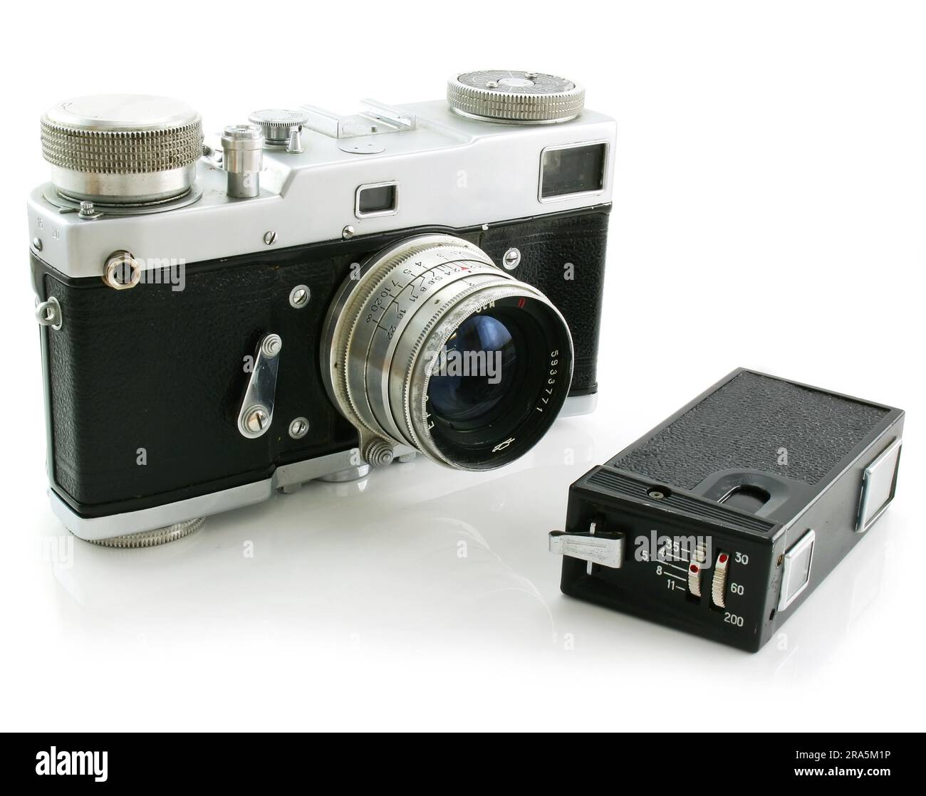 Kleine Spionage-Fotoapparat und Filmkamera isoliert auf weißem Hintergrund Stockfoto
