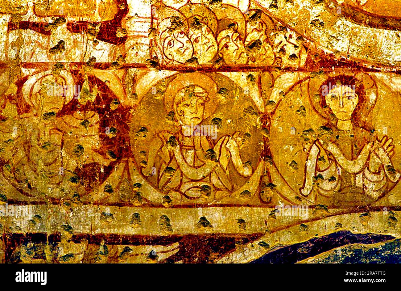 Houghton auf dem Hügel, Norfolk. Roundels, Jesus, zwei Apostel, Halousfiguren, 11. Jahrhundert, Romanische Wandmalerei Stockfoto