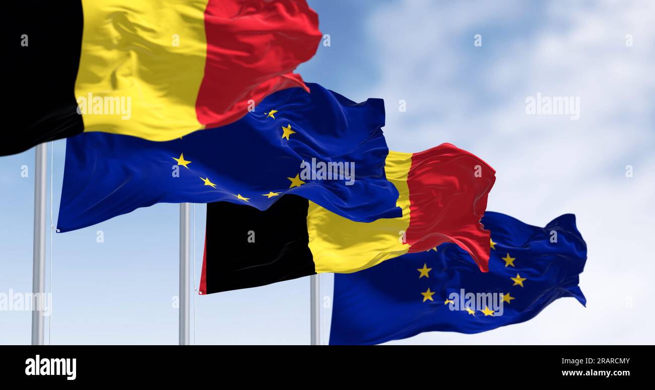 Die Flaggen Belgiens und der Europäischen Union winken an einem klaren Tag. Demokratie und Politik. Europäisches Land. Rendern der 3D-Darstellung Stockfoto