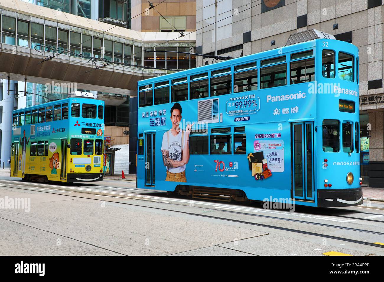 Traditionelle Straßenbahnen in Zentral, Hongkong, China Stockfoto