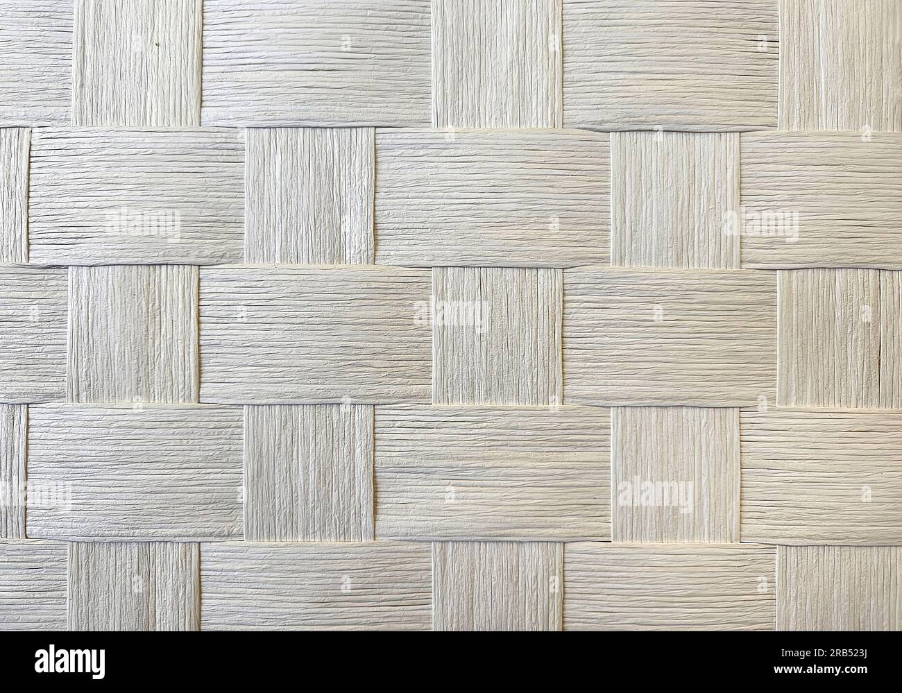 Nahaufnahme eines elfenbeinfarbenen Holzmusters Stockfoto