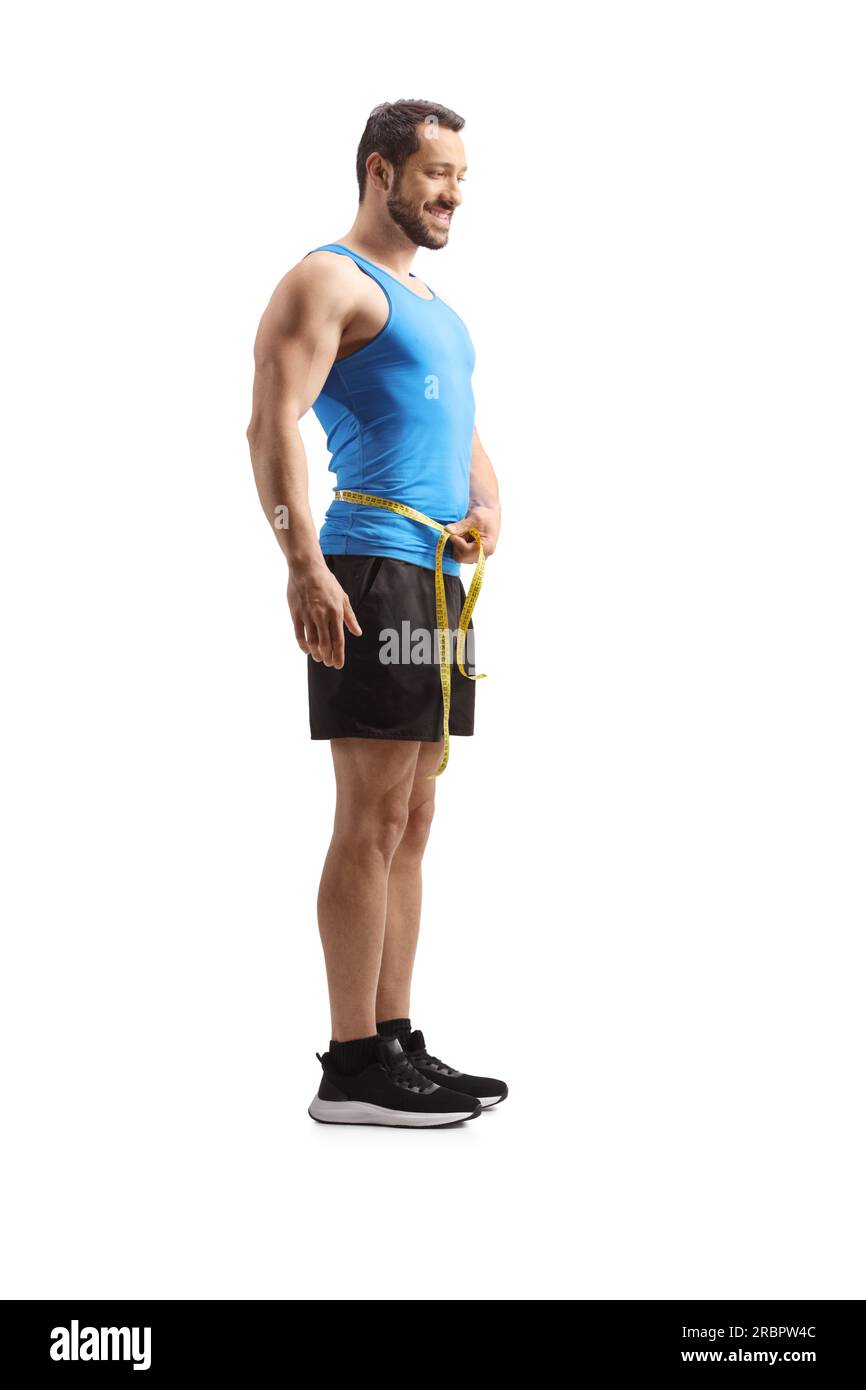 Aufnahme über die gesamte Länge eines Mannes in Sportbekleidung, mit isolierter Taille auf weißem Hintergrund Stockfoto