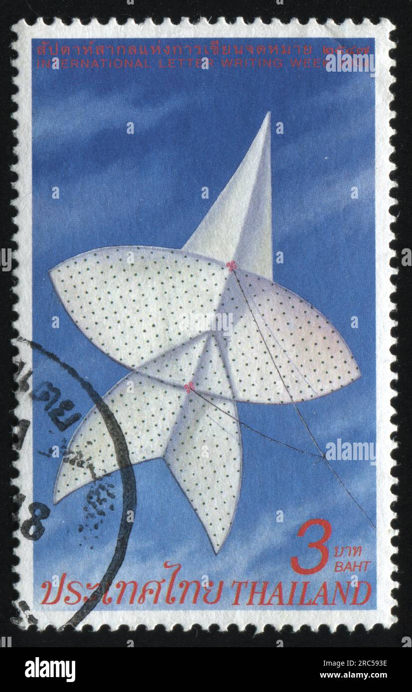 RUSSLAND KALININGRAD, 31. MAI 2016: Stempel gedruckt von Thailand, zeigt Drachen am Himmel, gewidmet der internationalen Briefschreibenwoche, circa 2004 Stockfoto