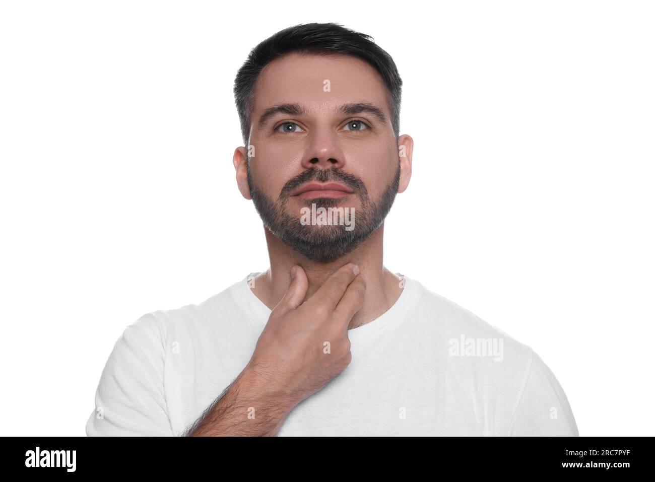 Endokrines System. Mann, der Schilddrüsen-Selbstuntersuchung auf weißem Hintergrund durchführt Stockfoto
