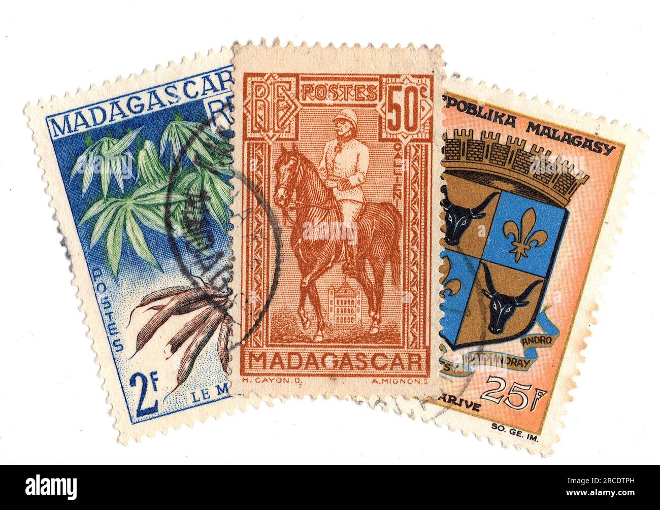 Alte Briefmarken aus Madagaskar auf weißem Hintergrund. Stockfoto