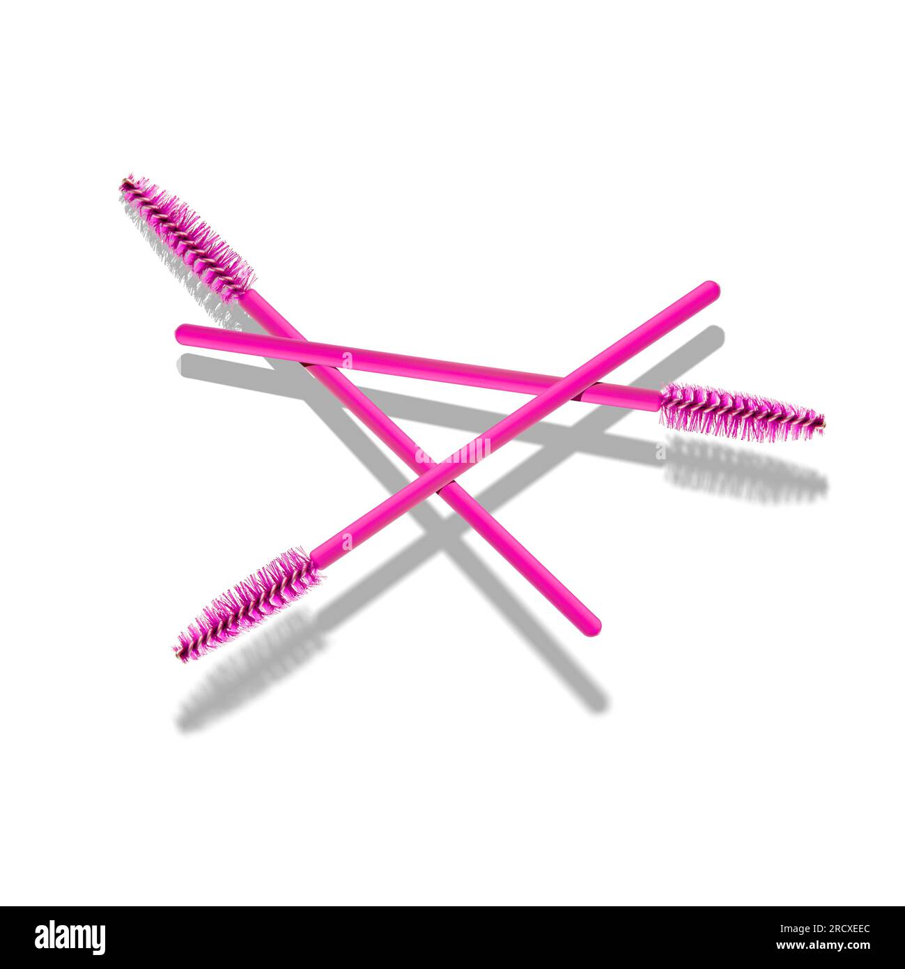 Eine Gruppe von drei pinkfarbenen Wimpernbürsten auf einem weißen, festen Hintergrund. Wimpern Zubehör Stockfoto