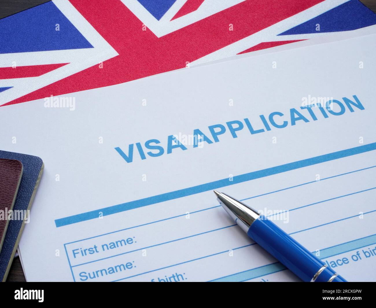 Visumantrag und Flagge Großbritanniens. Stockfoto