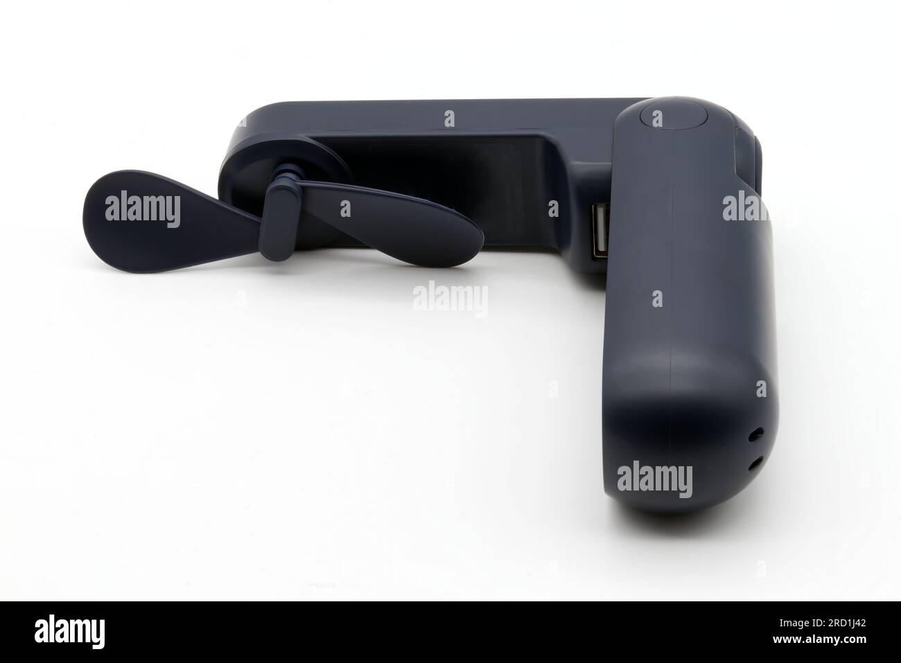 Manueller Mini-Lüfter isoliert auf weißem Hintergrund. Stockfoto