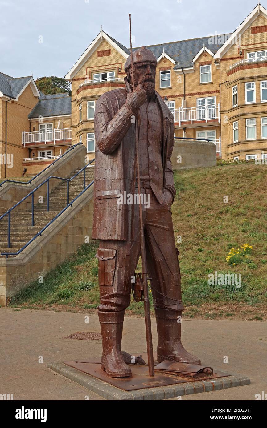 Stahlskulptur für Filey - A High Tide in Short Wellies, vom Künstler Ray Lonsdale, The Beach Rd, Filey, North Yorkshire, England, UK, YO14 9LW Stockfoto