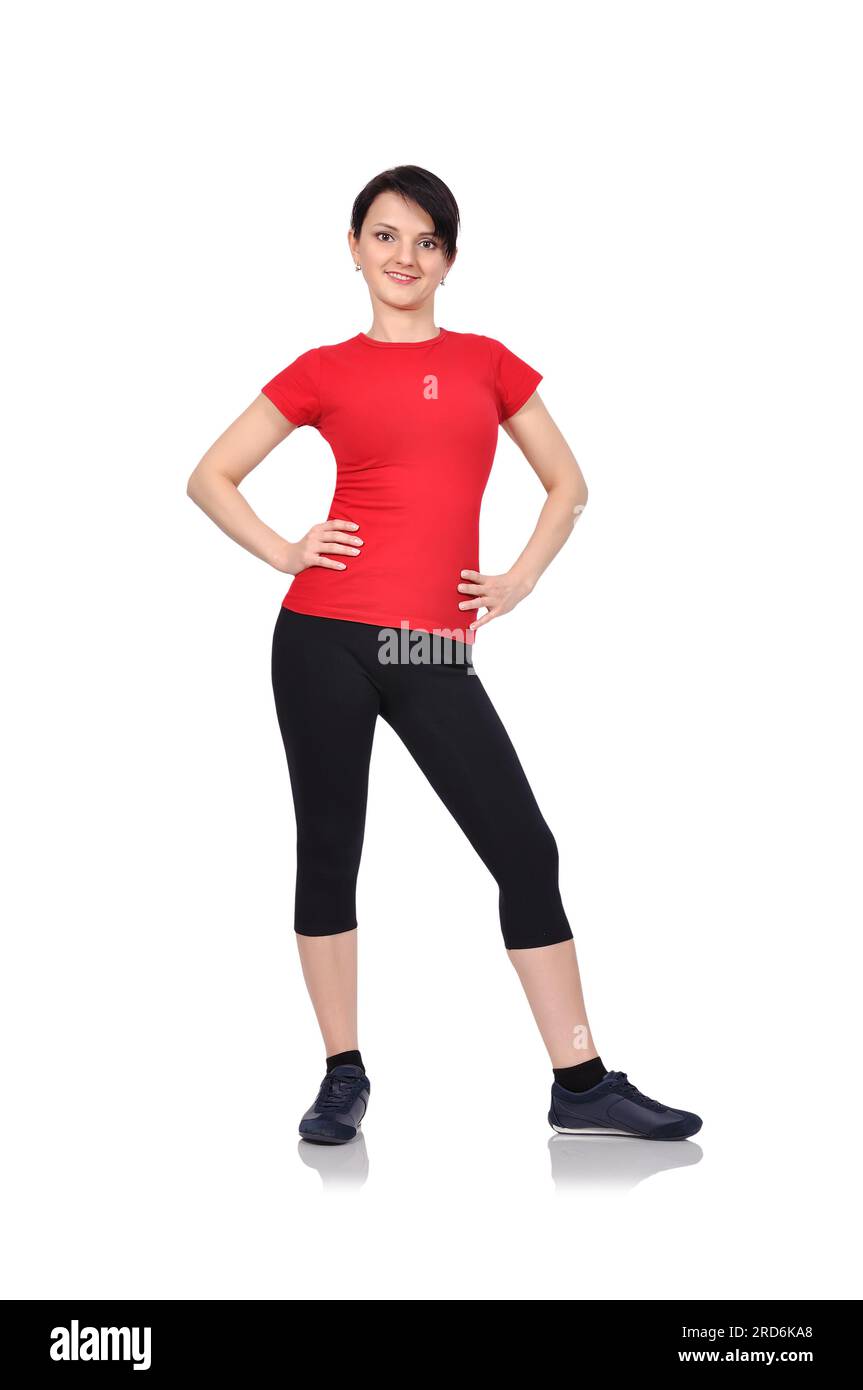 junge fröhlich lächelnde Frau in Sportbekleidung Stockfoto