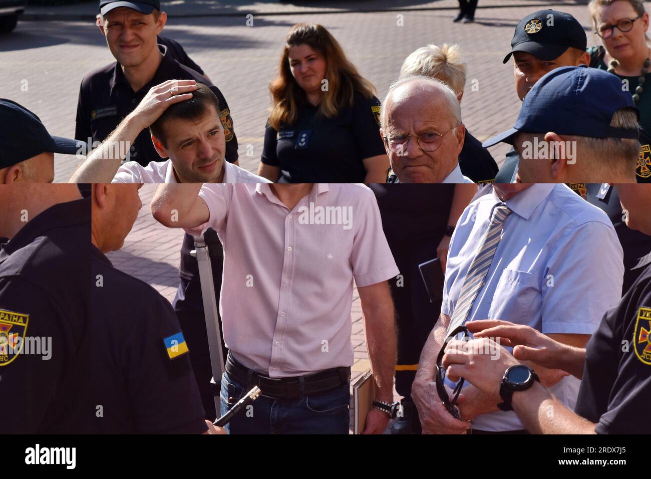 Juli 21, 2023, Zaporizhzhia, Ukraine: Chargé d'Affaires of the Embassy of Sweden to Ukraine Lennart Linner (rechts mit Brille) wird während seines offiziellen Besuchs im ukrainischen staatlichen Notdienst in Zaporizhzhia gesehen. USA Außenminister Antony Blinken hat gesagt, dass die Ukraine bereits etwa die Hälfte ihrer Territorien zurückerlangt hat, die seit Beginn der Invasion im großen Stil von Russland besetzt waren. Gleichzeitig seien die Streitkräfte der Ukraine während der Gegenoffensive einem erheblichen Widerstand ausgesetzt gewesen. Er sagte, dass die USA glauben, dass die ukrainische Gegenoffensive fortgesetzt wird Stockfoto