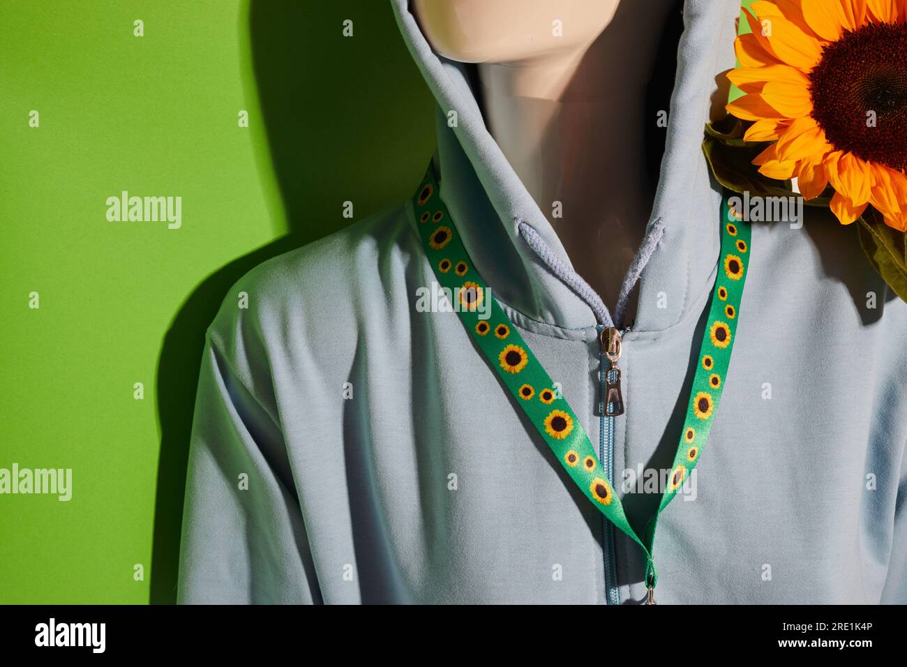 Sonnenblumen-Trageschlaufe, Symbol für Menschen mit unsichtbaren oder versteckten Behinderungen. Stockfoto