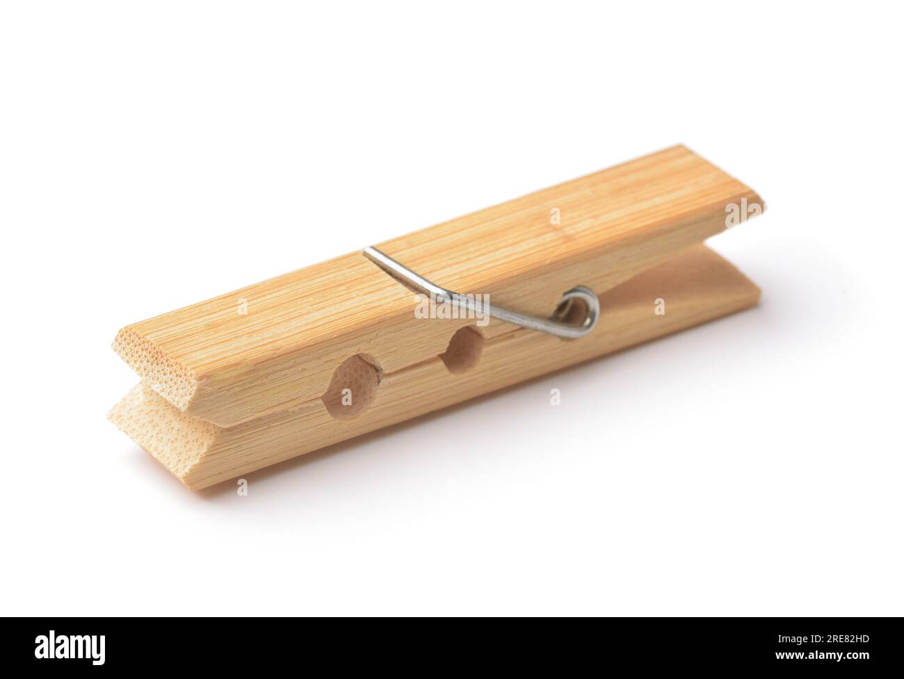 Einzelner Kleiderhaken aus Holz, isoliert auf weiß Stockfoto