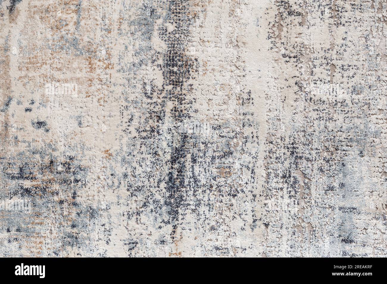 Struktur eines natürlichen Teppichs mit abstraktem Muster, Nahaufnahme. Moderner Teppich, Teppichhintergrund, Design, Fußbodenteppich, Interieur-Designelement Stockfoto