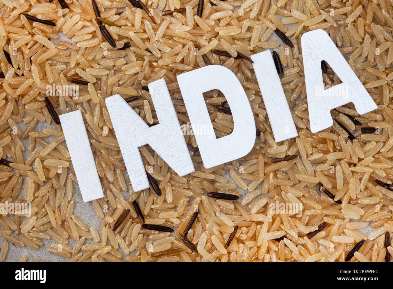 Indien mit Schriftzug auf einem Haufen Reis Stockfoto