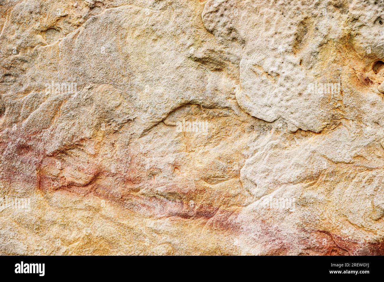 Hintergrundtextur aus Stein. Alte beigefarbene Steinmauer oder -Boden, Steinmuster Stockfoto