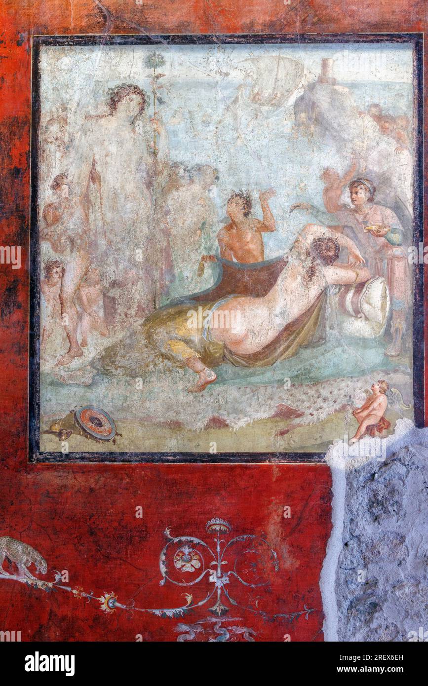 Ausgrabungsstätte Pompeji, Kampanien, Italien. Fresko, das den griechischen Mythos von Dionysos, die schlafende Ariadne zu finden und in h zu verlieben, illustriert Stockfoto Ausgrabungsstätte Pompeji, Kampanien, Italien. Fresko, das den griechischen Mythos von Dionysos, die schlafende Ariadne zu finden und in h zu verlieben, illustriert Stockfoto