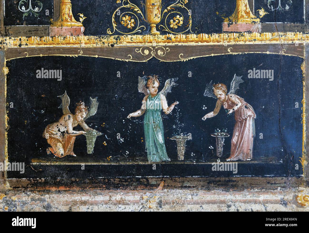 Ausgrabungsstätte Pompeji, Kampanien, Italien. Haus der Vettii. Casa dei Vettii. Ein Fresko, auf dem Psychologen Blütenblätter sammeln Stockfoto