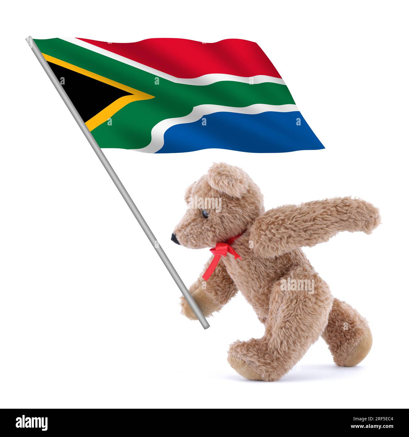 Eine Flagge der Republik Südafrika, die von einem süßen Teddybär getragen wird, weiß, grün, gelb, schwarz, blau Stockfoto