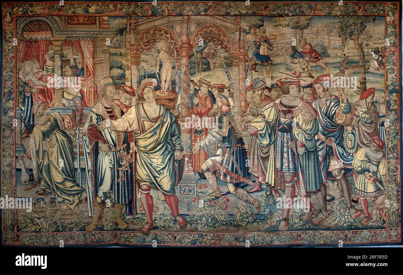 Cycle d'Oedipe: Laios consulte l'oracle de Delphes - Au Centre, avec sa Suite, il s'agenouile a l'entree du Temple - A gauche, sur un lit a Baldaquin, Jocaste est entouree des dames de sa cour qui lui apprennent la disparition de son nouveau ne - A droite, Laios remet son enfant a un officier lui sommant de le tuer - inable d'obeir a cet ordre, il attache l'enfant par les pieds et le Suspende a un arbre ou Phorbas, un berger de Corinthe le trouve - Tapisserie, (415 x655 cm), Karton attribue a Bernard van Orley (Barend, Barent, Bernaert van Brussel, 1488-1541) et a l'Atelier de Pieter Coecke Stockfoto