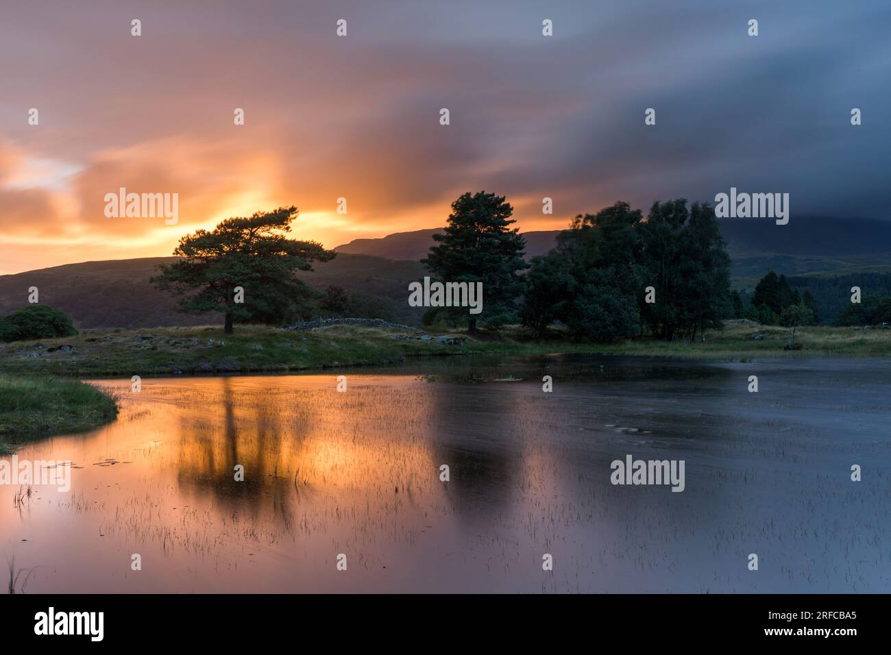 Kelly Hall Tarn, Torver, Coniston bei Sonnenuntergang Stockfoto