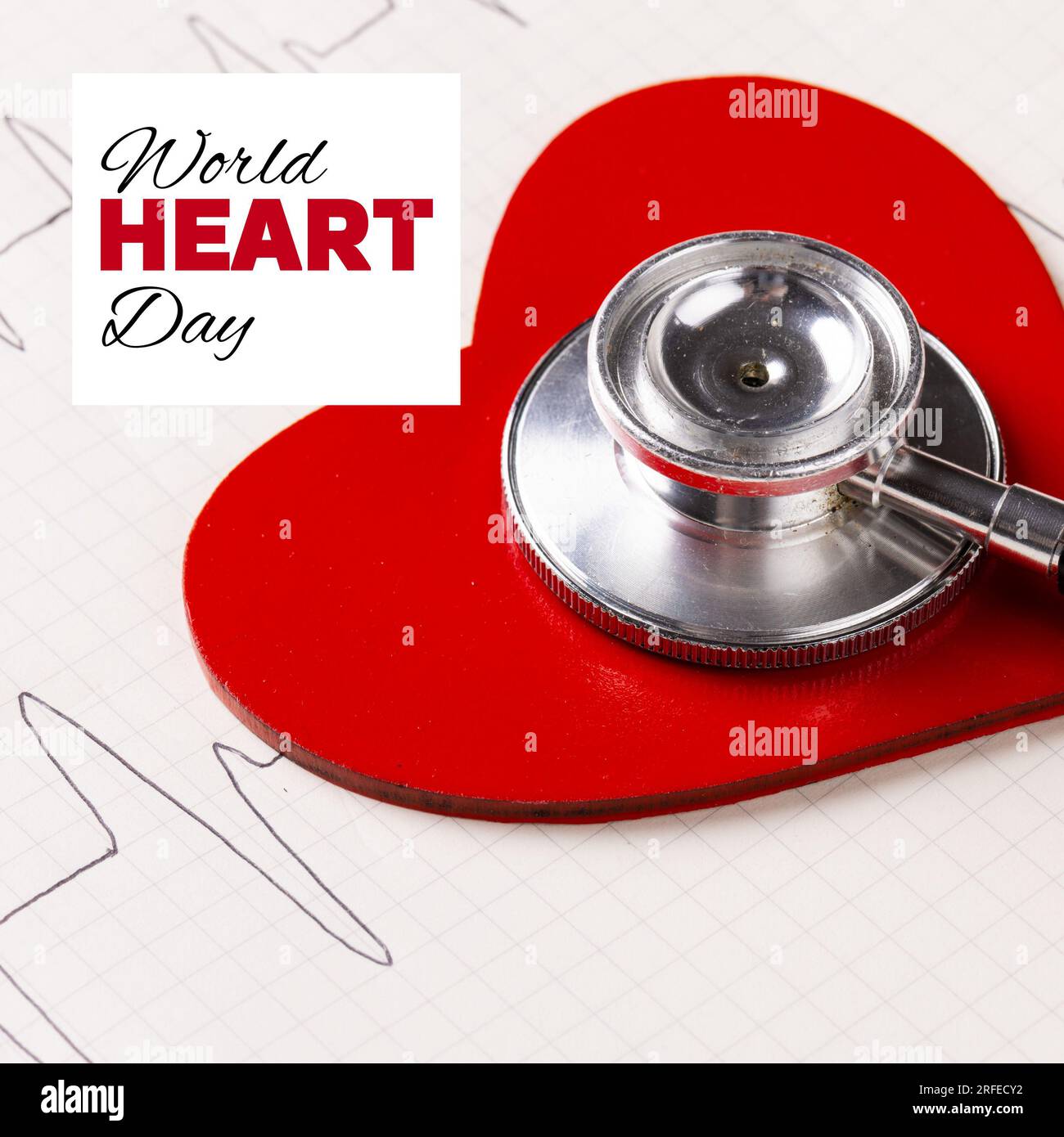 World Heart Day Text mit rotem Herz und Stethoskop und medizinischer Herzfrequenzmonitor-Karte Stockfoto