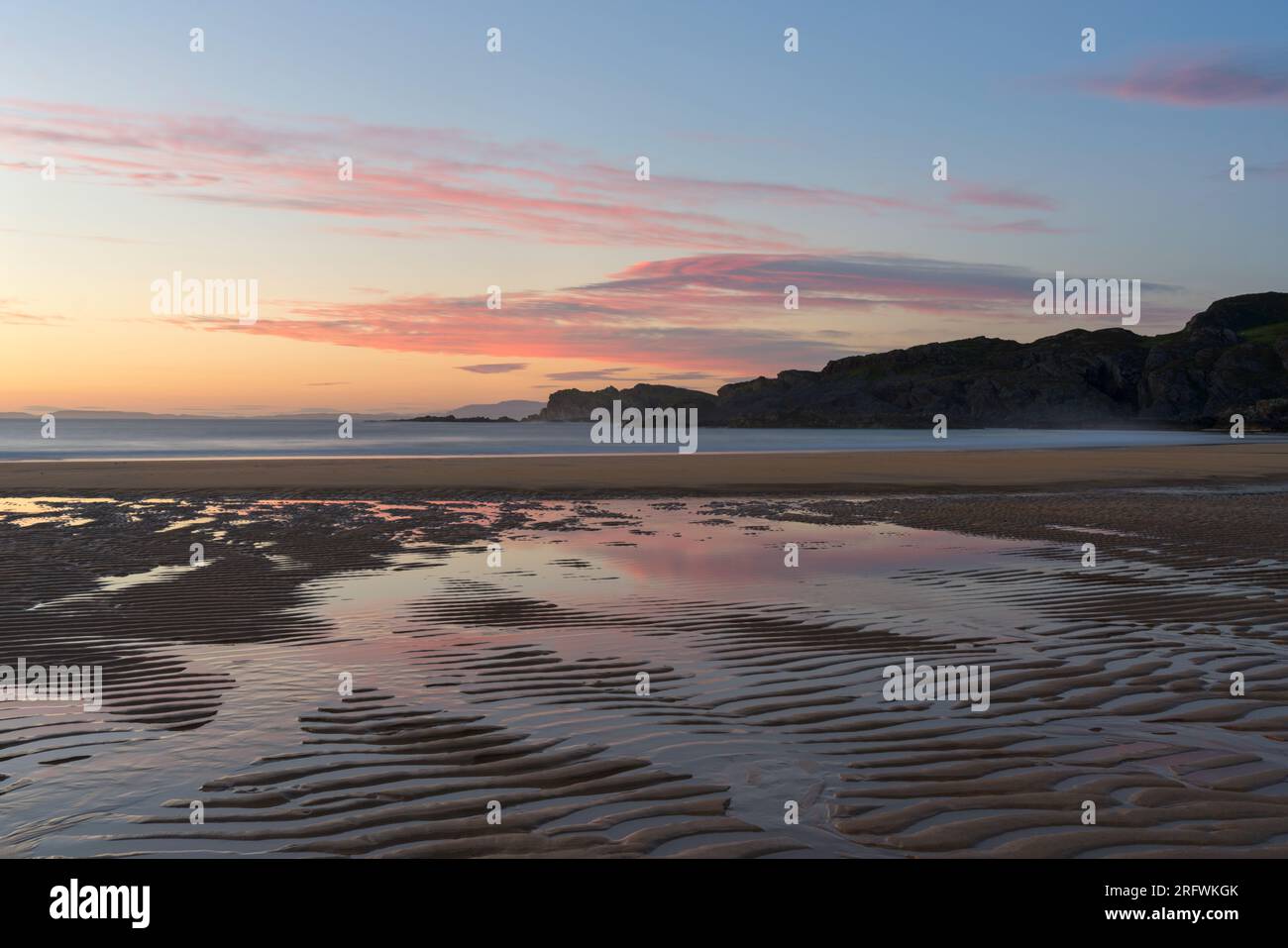 Sonnenuntergang, Kiloran Bay, Colonsay, Schottland Stockfoto