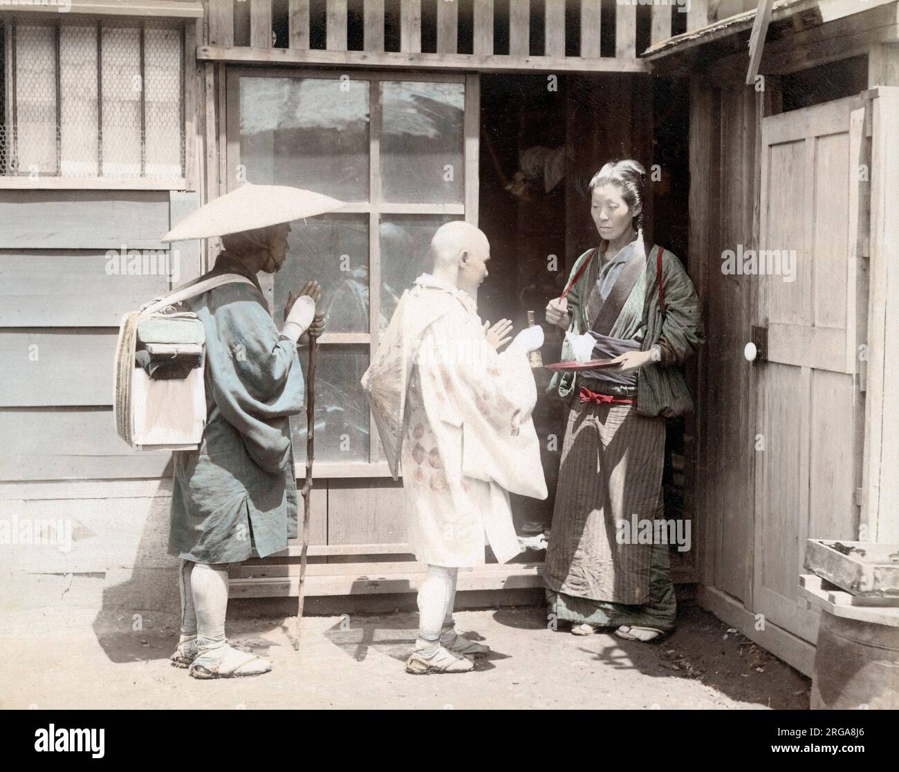 C. in 1880s Japan - Pilger betteln um Almosen. Stockfoto