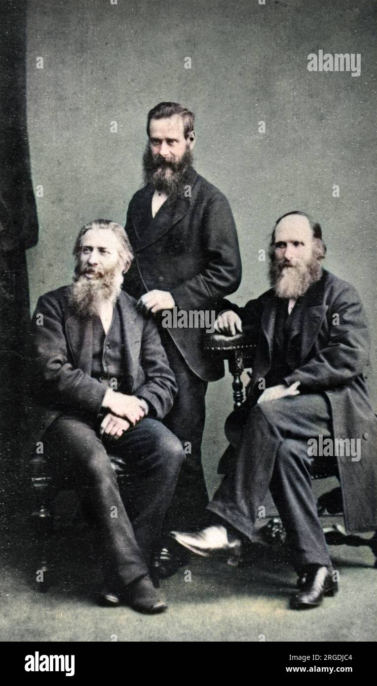 David Duguid (Zentrum, 1832-1907), schottisches Medium, bekannt für seine automatischen und direkten Zeichnungen. Hier gesehen mit James Bowman, Fotograf (links), und H Nisbet, Verleger (rechts), wahrscheinlich in Glasgow. Stockfoto