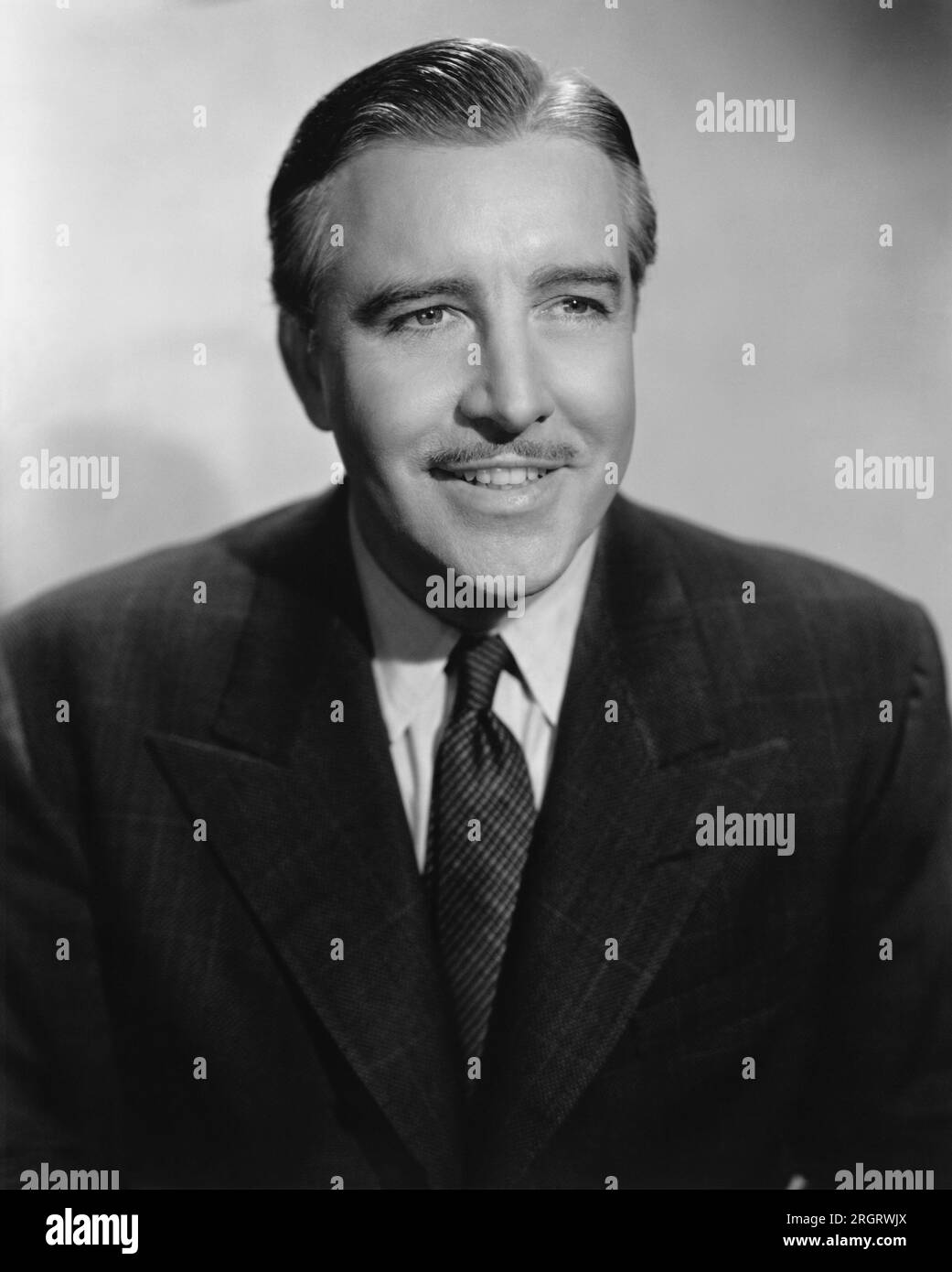 Hollywood, Kalifornien: 1942 Ein Porträt des Schauspielers John Boles. Stockfoto