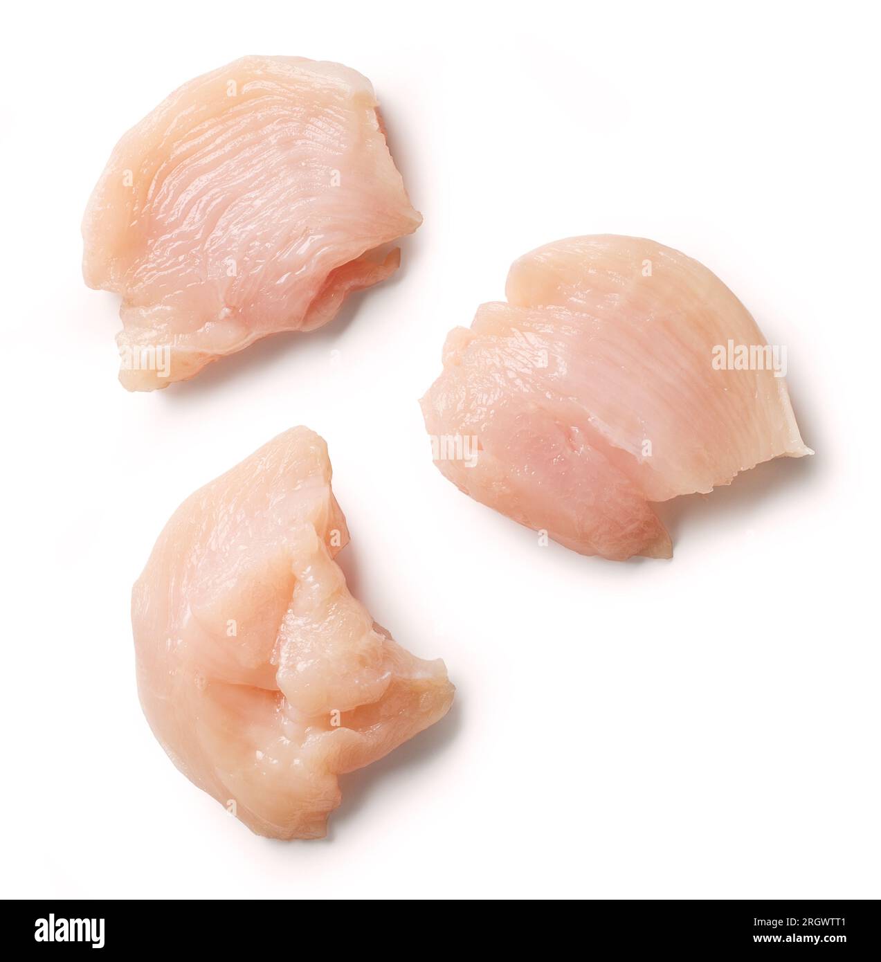 Frische rohe Hähnchenfiletstücke isoliert auf weißem Hintergrund, Draufsicht Stockfoto