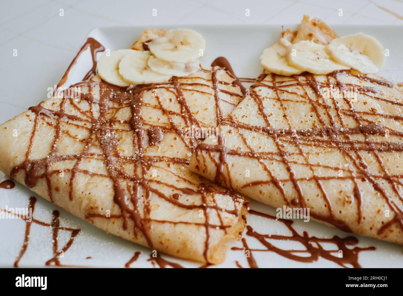 Eine Nahaufnahme für Crepes mit Banane und Schokolade Stockfoto