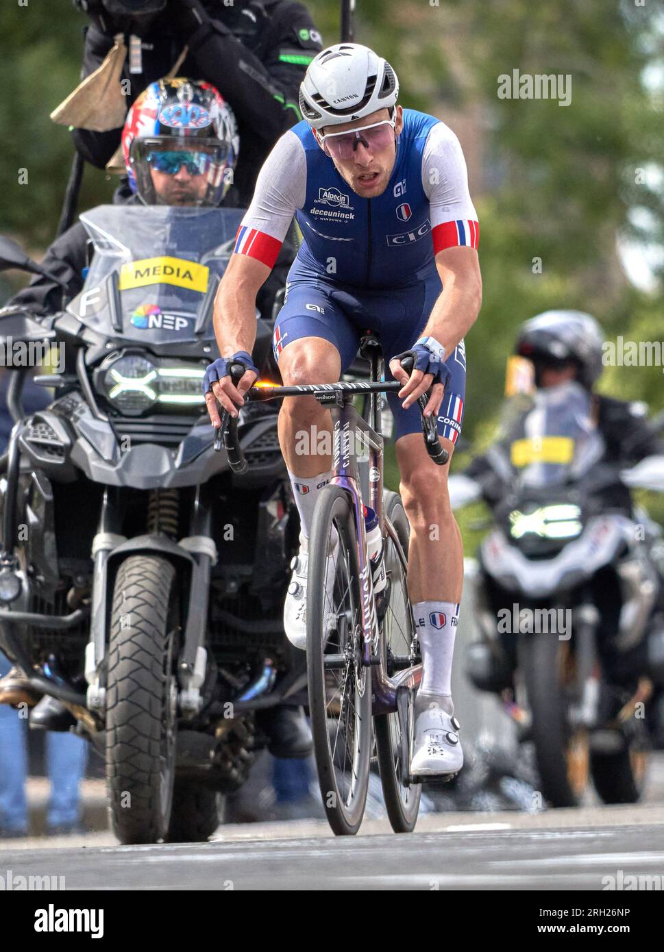 Bei der UCI-Radweltmeisterschaft in Glasgow, Schottland, hat Axel Lasured (Frankreich) den Sieg bei einem attributiven Straßenrennen unter 23 Jahren beansprucht. Stockfoto