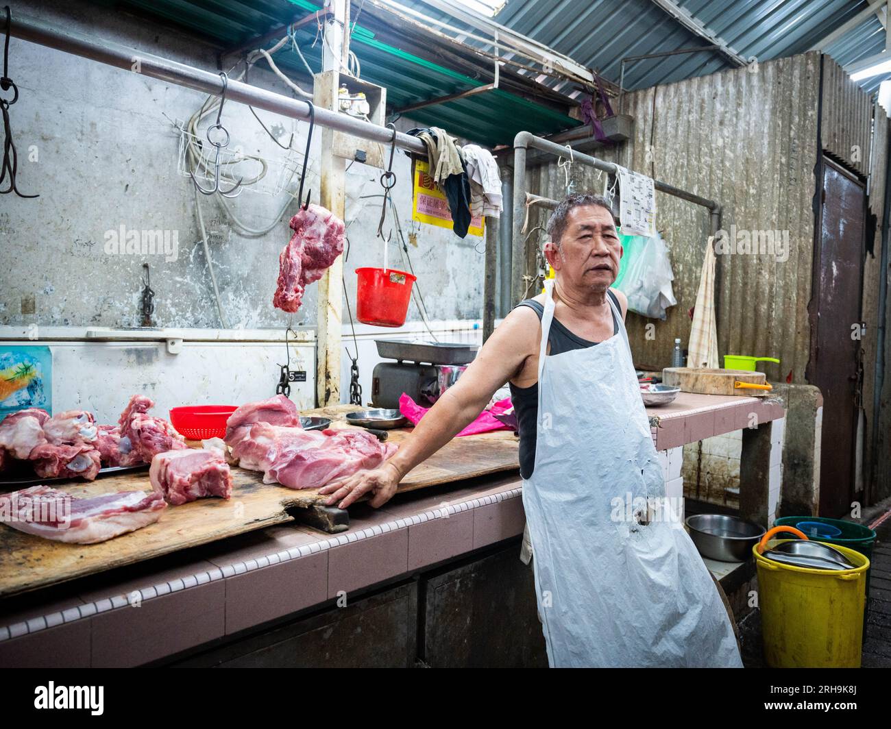 Metzger auf dem chinesischen Nassmarkt Stockfoto