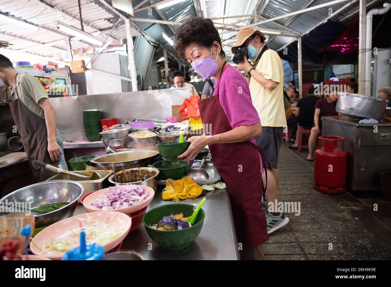Kochen im chinesischen Nassmarkt, Kuala Lumpur, Malaysia Stockfoto