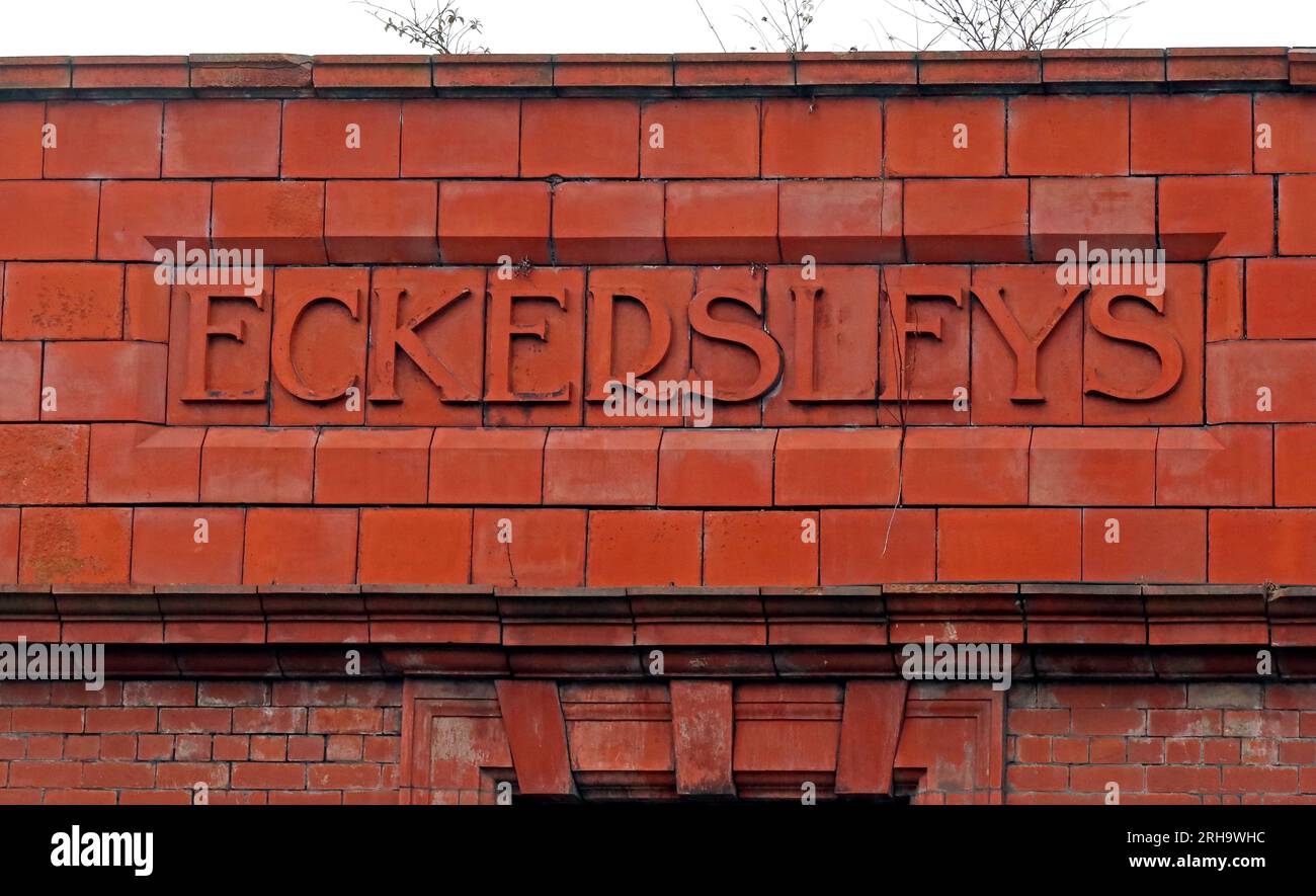 Eckersleys Fabrikname in rotem Backstein, Geschichte des Wigan Pier - historisch eine der größten integrierten Textilfabriken in England, Großbritannien, WN3 5BS Stockfoto